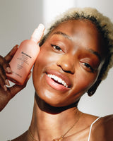 model with PEACHY CLEAN Milky Oil Cleanser