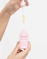 Model applying DAWN ELIXIR Active Oils Blend