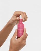 model with Dusk Elixir Active Oil Blend