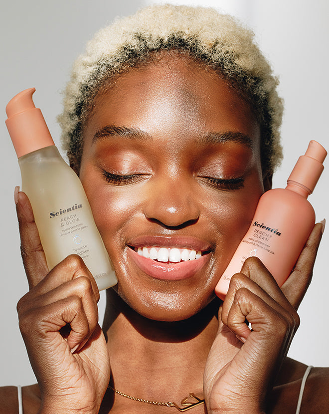 model with Peach & Glow Hydra Skin Tonic and Peachy Clean Milky Oil Cleanser
